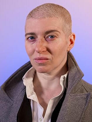Dramatic headshot of actress Nadine Charleson Dramatic headshot of actress Nadine Charleson